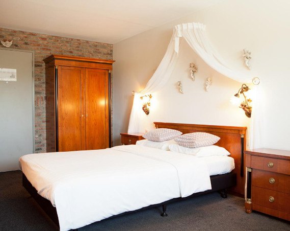 Een hotelkamer bij Hotel de Druiventros is van alle gemakken voorzien